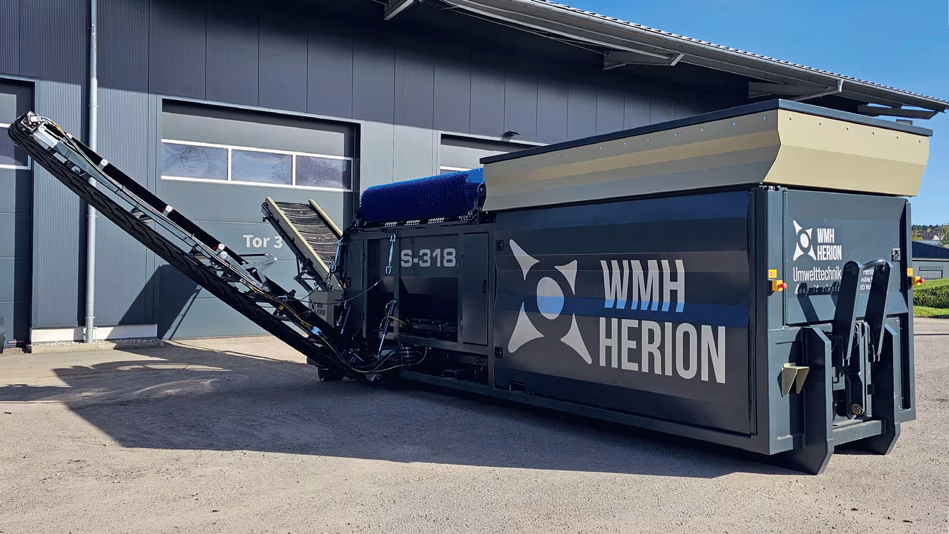 Trommelsiebmaschine WMH Herion S-318 – Hakenmobile Siebmaschine
